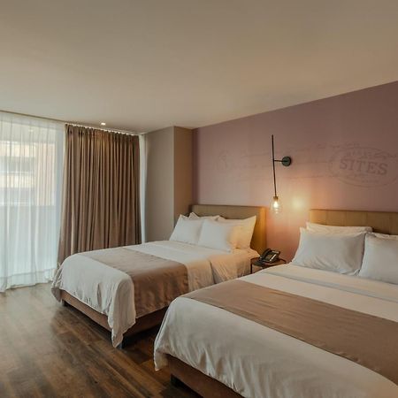 Sites Hotel 메딜린 외부 사진 A room at the hotel