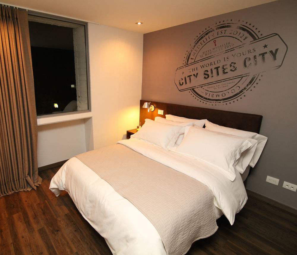 Sites Hotel 메딜린 외부 사진 A bedroom at the hotel